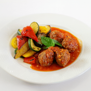 Albondigas estofadas con wok de verduras